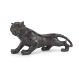 Large Japanese patinated bronze tiger, 32cm in length :For Further Condition Reports Please Visit