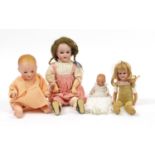 Four Armand Marseille bisque headed dolls with jointed limbs, numbered 351, 351, 370 and 590, the