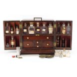 19th century mahogany apothecary table cabinet with inset brass carry handle and secret compartment,