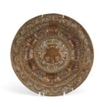 Antique copper plate embossed with a heraldic crest, 27.5cm in diameter :For Further Condition