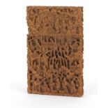 Chinese Canton sandalwood card case profusely carved with figures amongst pagodas crossing