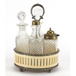 Early Victorian pierced ivory and silver plated cruet set with four glass bottles, 21.5cm high :