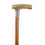 Horn handled walking stick with silver collar and Malacca shaft, possibly rhinoceros horn, 81.5cm in