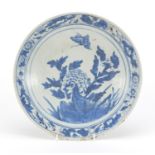 Chinese blue and white porcelain plate hand painted with a butterfly above flowers, 27.5cm in
