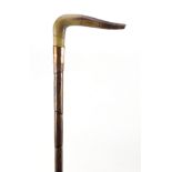 Horn handled walking stick with gilt metal collar, possibly rhinoceros horn, 91.5cm in length :For