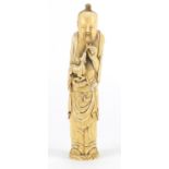 Good Chinese ivory carving of Shou Lao holding a deer, Ming Dynasty, 24cm high :For Further