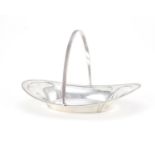 Arts & Crafts style sterling silver oval basket with swing handle, 25.5cm in length :For Further