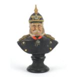 German hand painted terracotta bust of a soldier in Military dress by Deponirt, 11.5cm high :For