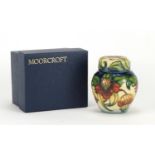 Moorcroft pottery ginger jar and cover with box, hand painted in the Anna Lily pattern, 11cm high :