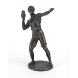 Patinated bronze figure of a young boy throwing a brick , 18cm high :For Further Condition Reports
