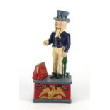 Novelty cast iron Uncle Sam money box, 28cm high :For Further Condition Reports Please Visit Our