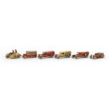 Six German tin plate clock work vehicles including Royal Mail van, Shell van and an ambulance :For