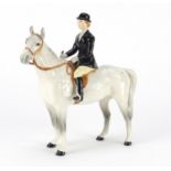 Beswick huntswoman on a dapple grey horse, 21cm high :For Further Condition Reports Please Visit Our