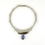 Modernist silver necklace set with a cabochon blue stone, TUL makers mark, 83.6g :For Further