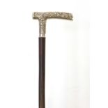 Chinese walking stick with silver handle embossed with a dragon and figures, 86cm in length :For