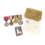 British Military World War I medal group and brass Mary tin including including a trio awarded to
