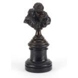 19th century classical patinated bronze of lovers kissing, raised on circular ebonised base, the