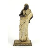 Cold painted figurine of an Arab female holding a fan in the style of Franz Xaver Bergmann, 34cm