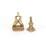 Two Victorian unmarked gold hardstone fobs one in the form of two birds, the largest 2.5cm high, 5.