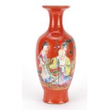 Chinese porcelain iron red ground vase, hand painted in the famille rose palette with Shou Lau
