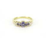 9ct gold purple stone and diamond ring, size N, 2.6g :For Further Condition Reports Please Visit Our