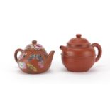 Two Chinese Yixing terracotta teapots including one enamelled with birds and butterflies amongst