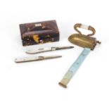 Objects comprising a tortoiseshell casket, Victorian brass iron design tape measure with agate