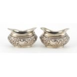 Pair of Victorian silver open salts with embossed decoration, SB Birmingham 1902, 6.5cm in length,