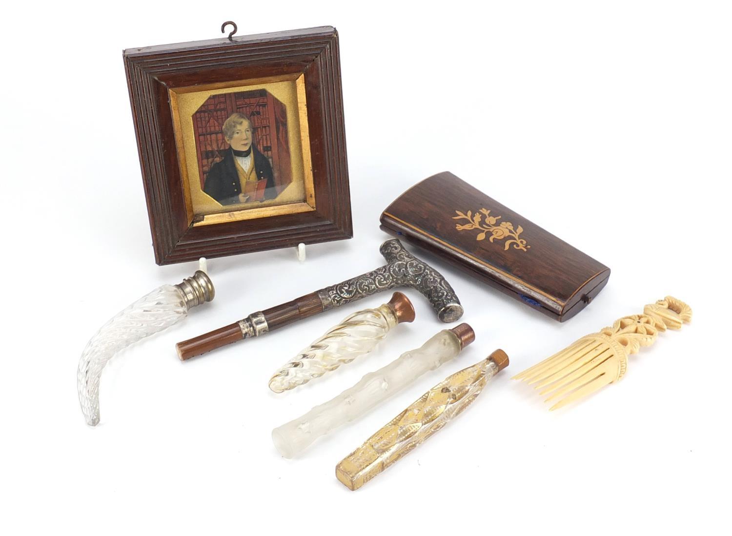 Objects including an embossed silver parasol handle, antique glass scent bottles, portrait miniature