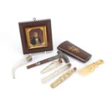 Objects including an embossed silver parasol handle, antique glass scent bottles, portrait miniature
