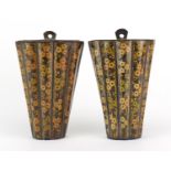 Pair of Kashmir papier-mâché lacquered wall pockets, decorated with flowers, each 17cm high :For