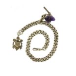 Large silver watch chain with T bar, sports jewel and carved amethyst skull fob, 36cm in length,
