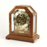 German eight day mantel clock with subsidiary dial by Kieninger striking on eight rods, housed in