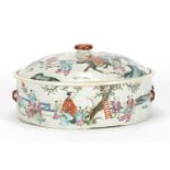 Chinese porcelain pot and cover with twin iron red handles, finely hand painted in the famille