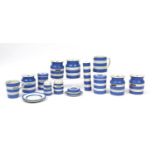 T G Green & Co kitchenware including storage jars, jugs, sifters and rolling pin, the largest 25cm