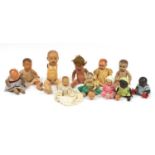 Eleven vintage dolls and three heads including a large German example by Heinrich Handwerck and