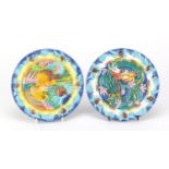 Pair of Chinese porcelain phoenix and dragon plaques, each 17cm in diameter :For Further Condition