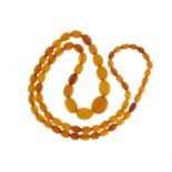 Butterscotch amber coloured bead necklace, 80cm in length, 46.0g :For Further Condition Reports
