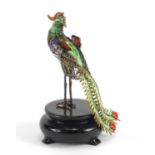 Chinese silver and enamel peacock raised on an ebonised stand, impressed silver to the underside,