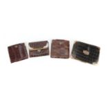 Four crocodile skin effect leather wallets and purses, one with 9ct gold mounts the others with