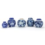 Five Chinese blue and white porcelain ginger jars, four with covers, each hand painted with prunus