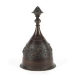 Bronze bell decorated with insects amongst flowers, 11cm high :For Further Condition Reports