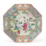 Chinese octagonal porcelain charger, hand painted in the famille rose palette with figures in a