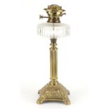 Victorian Hinks & Sons patent brass oil lamp with column above a pierced base, 49cm high :For