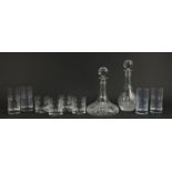 Two Waterford crystal Marquis decanters and two sets of four crystal glasses, the largest 31cm