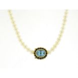 Single string pearl necklace with 9ct gold blue stone and sapphire clasp, 44cm in length, 21.0g :For