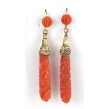 Pair of Victorian carved coral drop earrings with 9ct gold mounts, 5.5cm in length, 5.2g :For