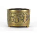 Chinese bronze tripod censer, cast in relief with figures by prunus and bamboo trees, six figure