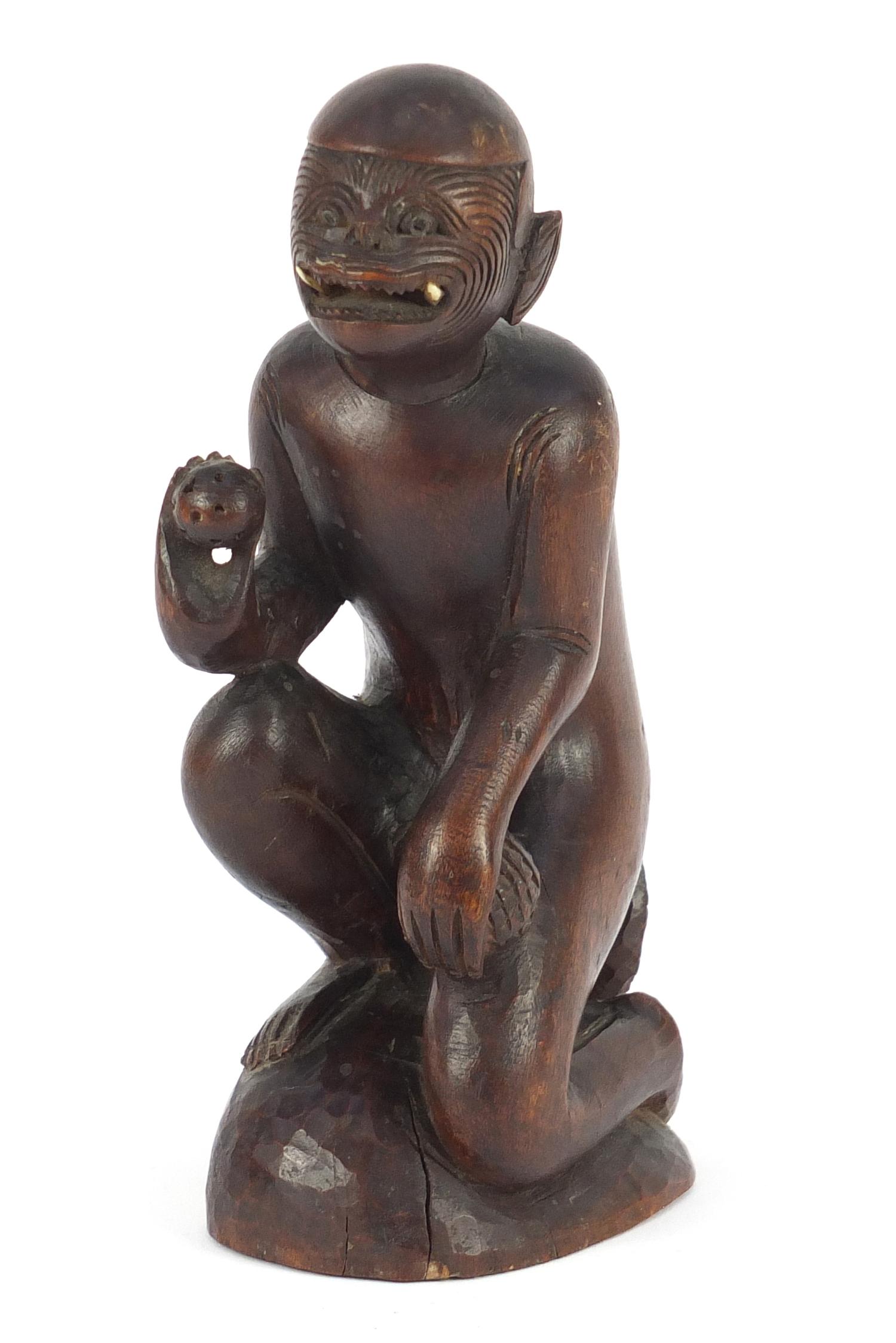 Tribal interest carved wood figure, possibly Polynesian, 22.5cm high :For Further Condition