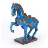 Chinese blue glazed tang style horse, 31.5cm high :For Further Condition Reports Please Visit Our